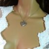 N1957terf_Collier_femme_coeur_porte-photo_metal_argente