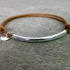 N2034terter_Bracelet_cordon_cuir_et_tube_argent_massif