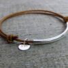 N2034terterb_Bracelet_cordon_cuir_et_tube_argent_massif