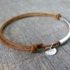 N2034terterc_Bracelet_cordon_cuir_et_tube_argent_massif
