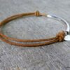 N2034terterd_Bracelet_cordon_cuir_et_tube_argent_massif