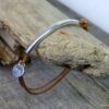 N2034terterf_Bracelet_cordon_cuir_et_tube_argent_massif
