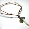 N2703terc_collier_cordon_cuir_et_dent_tigre_nacre