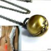 N3189tern_collier_long_sautoir_montre_gousset_boule_bronze