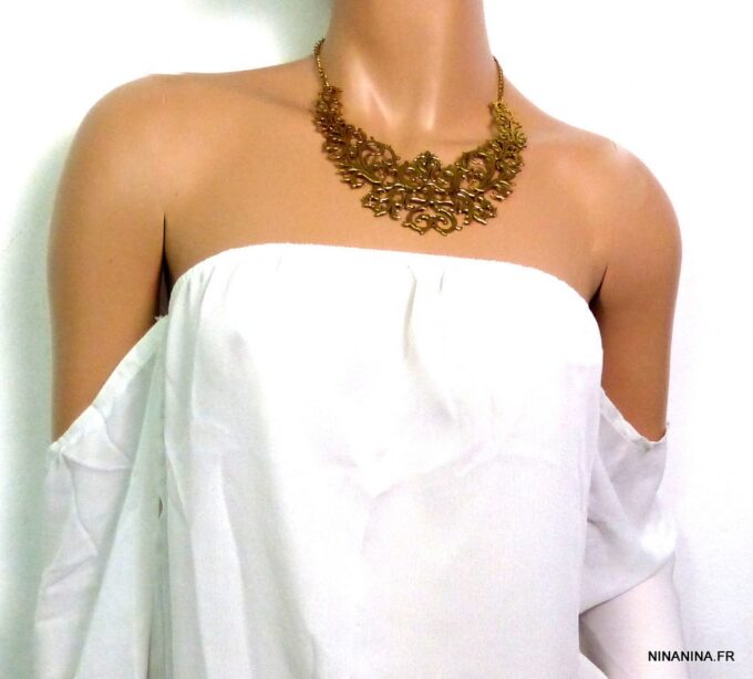 N3208terg_collier_plastron_volutes_metal_dore