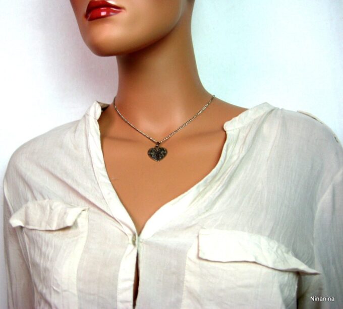 N3366terc_collier_de_dos_coeur_metal_argent