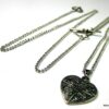 N3366tere_collier_de_dos_coeur_metal_argent