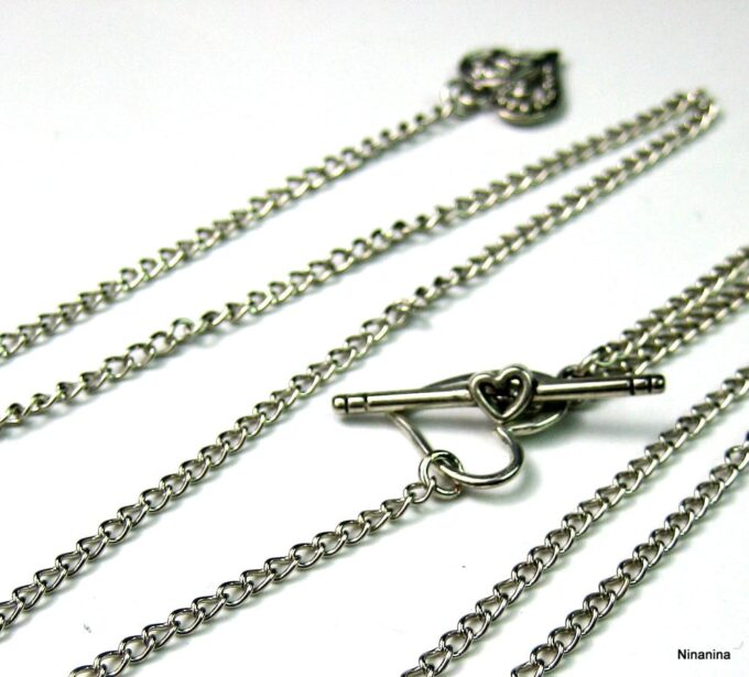 N3366terg_collier_de_dos_coeur_metal_argent