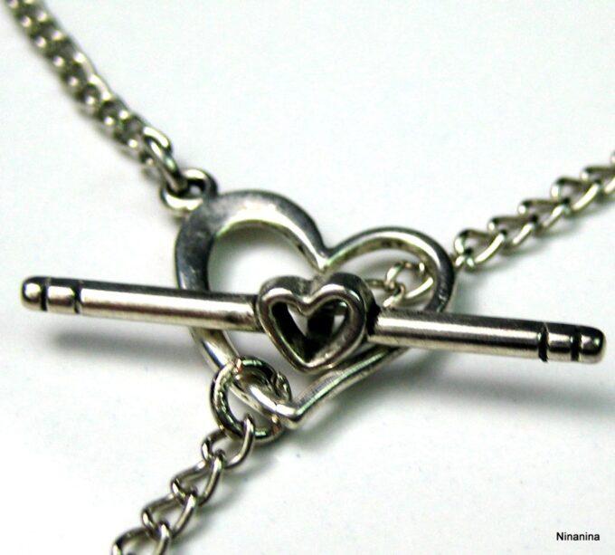 N3366teri_collier_de_dos_coeur_metal_argent