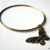 N3669b_bracelet_jonc_papillon_acier_inoxydable_dore