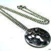 N3673_collier_disque_metal_argente_martele