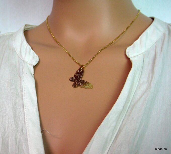 N3791f_collier_papillon_acier_inoxydable_dore