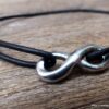 N3956b_Bracelet_homme_cordon_cuir_infini_acier_argente_-_Bijoux_Bracelets_en_ligne_Ninanina