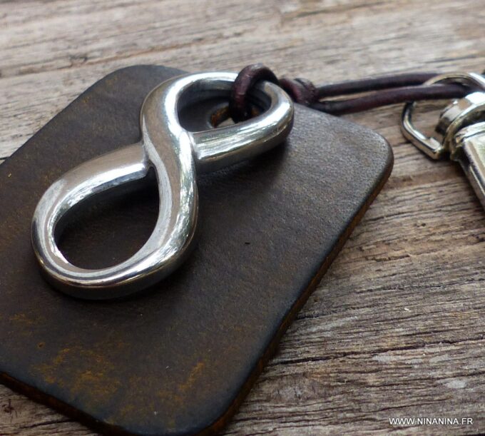 N3959a_Porte_cles_cuir_infini_acier_inoxydable_argent_-_Bijoux_Porte_cles_en_ligne_Ninanina