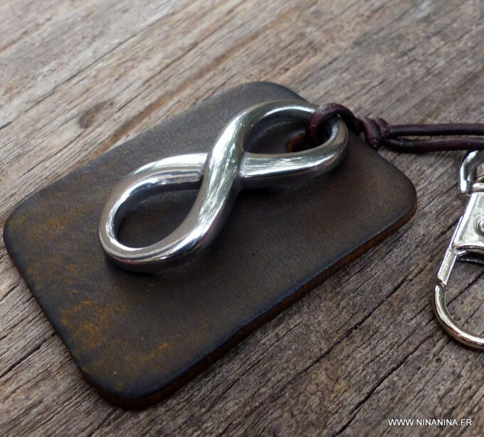 N3959g_Porte_cles_cuir_infini_acier_inoxydable_argent_-_Bijoux_Porte_cles_en_ligne_Ninanina