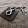 N3959h_Porte_cles_cuir_infini_acier_inoxydable_argent_-_Bijoux_Porte_cles_en_ligne_Ninanina