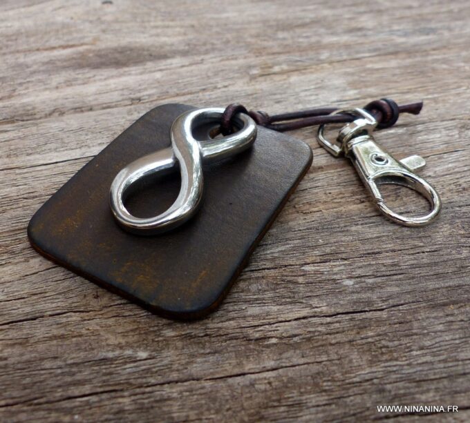 N3959h_Porte_cles_cuir_infini_acier_inoxydable_argent_-_Bijoux_Porte_cles_en_ligne_Ninanina