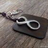 N3959i_Porte_cles_cuir_infini_acier_inoxydable_argent_-_Bijoux_Porte_cles_en_ligne_Ninanina