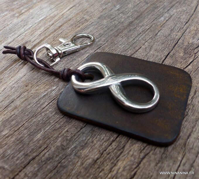 N3959i_Porte_cles_cuir_infini_acier_inoxydable_argent_-_Bijoux_Porte_cles_en_ligne_Ninanina