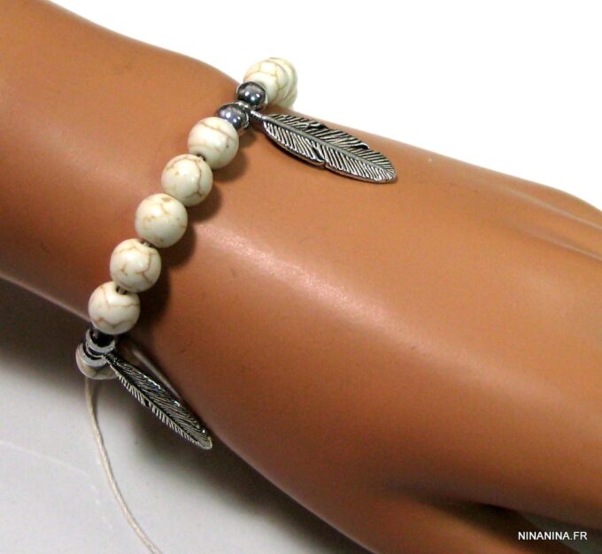 N4589c_bracelet_cordon_perles_ivoires_et_plumes_argent