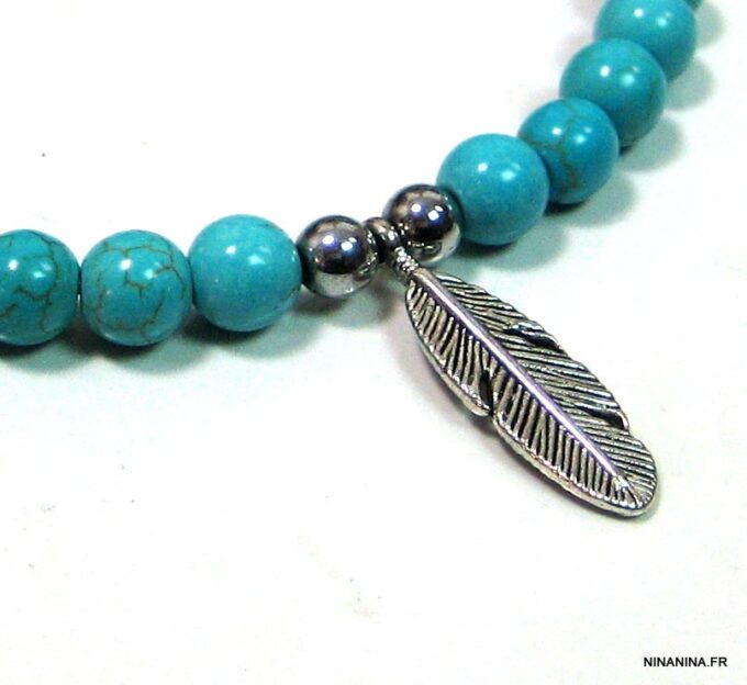 N4589i_bracelet_cordon_perles_ivoires_et_plumes_argent