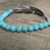 N4689bisd_Bracelet_plume_metal_argente_et_turquoises_veritables