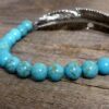 N4689bisf_Bracelet_plume_metal_argente_et_turquoises_veritables
