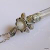 N1074e Collier Fleur Blanc Fiole De Parfum En Verre Et Acier Inoxydable - Bijoux Colliers en ligne Ninanina