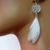 N1194terd boucles plaque argent et plumes