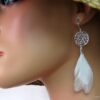 N1194tere boucles plaque argent et plumes