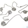 N1503_Sautoir_arabesques_metal_argent