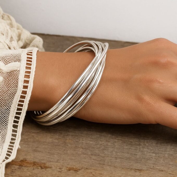 N2181d Bracelet Jonc Femme 10 Anneaux Entrelacés en Argent Plaqué – Élégance et Brillance Intemporelle - Bijoux Bracelets anneaux entrelacés en ligne Ninanina