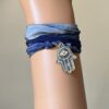 N2460e Bracelet pendentif main de fatma acier inoxydable sur galon de soie bleu - Bijoux Bracelets femmes en ligne Ninanina