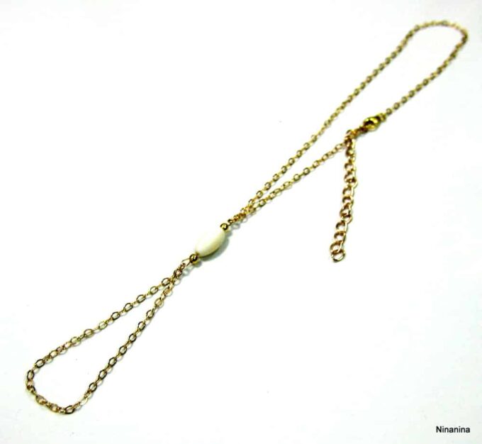 N2558terb bijou de pied plaqué or et nacre