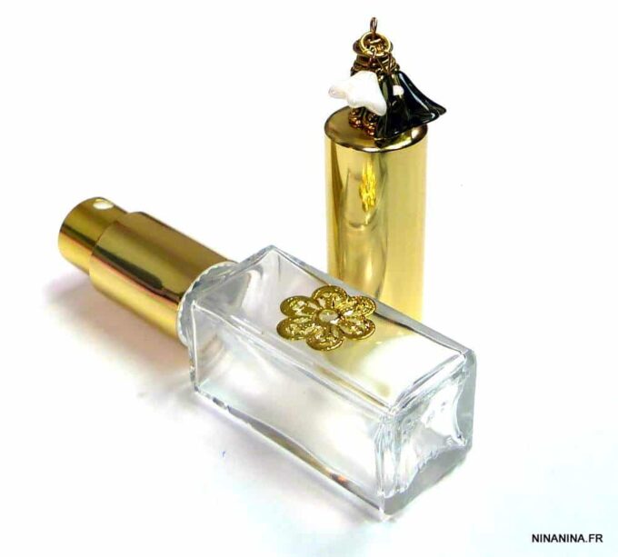 N303ter vaporisateur de sac verre et métal doré