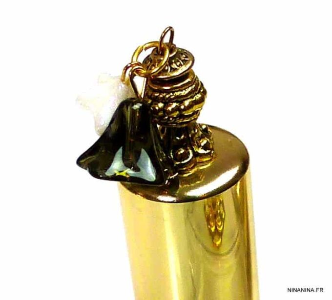 N303terc vaporisateur de sac verre et métal doré