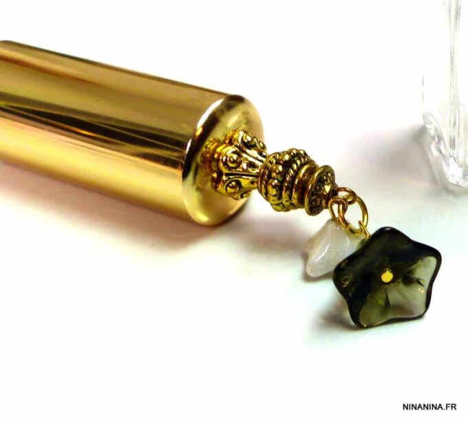 N303terd vaporisateur de sac verre et métal doré