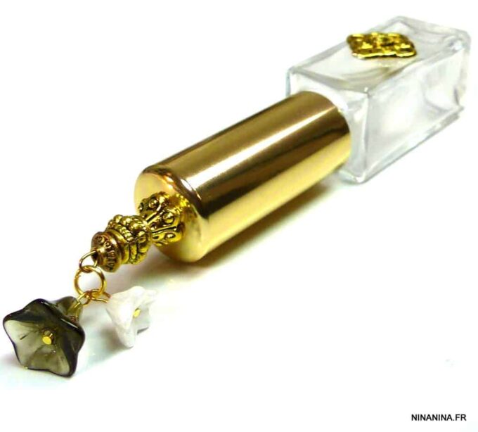 N303terg vaporisateur de sac verre et métal doré