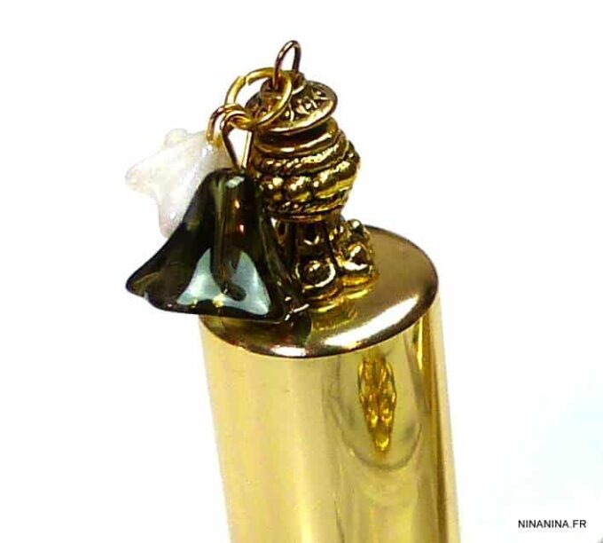 N303terk vaporisateur de sac verre et métal doré