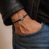 N3767e Bracelet homme femme signe infini Acier Inoxydable argenté cordon cuir - Bijoux Bracelets infinity en ligne Ninanina