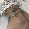 N4086e Chaine de cheville Inde en métal argenté pierres turquoises - Bijoux de pied en ligne Ninanina