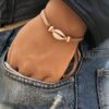N4148c Bracelet avec coquillage cauri Argent 925 sur cordon homme - Bijoux Bracelets en ligne Ninanina