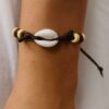 N4168b Bracelet coquillage Cauri blanc femme – Cordon coton ciré réglable fait main en France - Bijoux bracelets cauris en ligne Ninanina