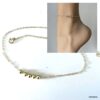 Chaîne de cheville en plaqué or avec perles rondes portée par une femme - Bijou chic et intemporel disponible chez Ninanina