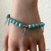 N4588a Bracelet Howlite Turquoise breloques plume argentée - Bijoux Bracelets en ligne Ninanina