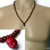 N4920 collier homme perles bois tête de mort rouge