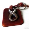 N5615E Porte clé homme cuir infini acier - Bijoux en ligne NINANINA