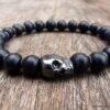 N5633b Bracelet elastique homme perles bois noir tête de mort métal noire - Bijoux Bracelets en ligne Ninanina