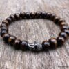 N5674 Bracelet elastique homme bouddha métal noir perles bois marron - Bijoux Bracelets en ligne Ninanina