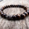 N5674c Bracelet elastique homme bouddha métal noir perles bois marron - Bijoux Bracelets en ligne Ninanina